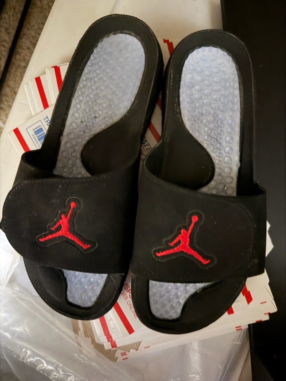 Jordan Black Slide Sandals with Red Logo
